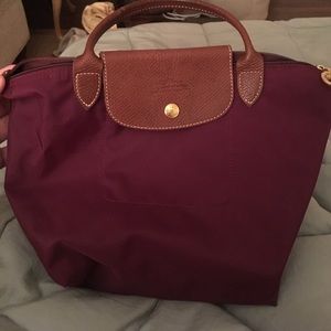 Longchamp Bags - Longchamp burgundy tote. Like new. Folds up. Longchamp Bags - Longchamp burgundy tote. Like new. Folds up.